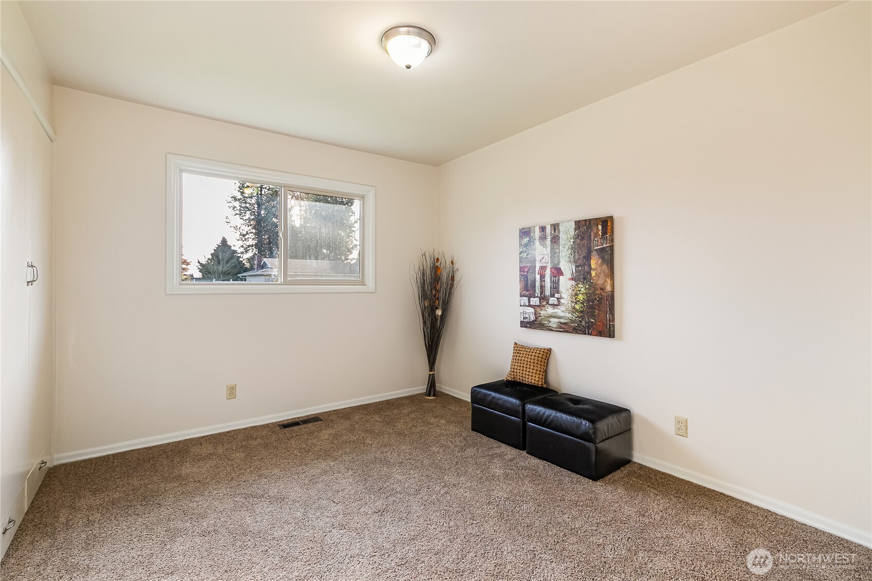 1510 E Street Lynden, WA 98264 - Photo 22 of 32 a room with furniture and a window
