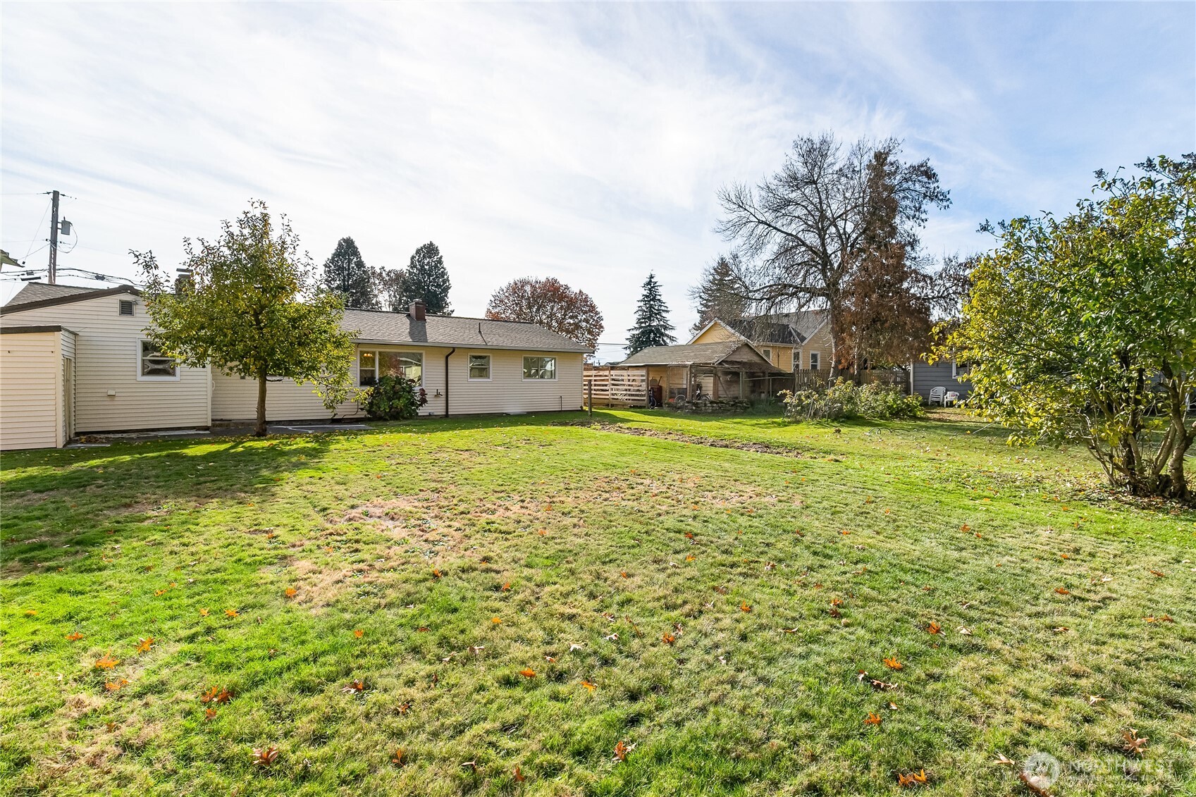 1510 E Street Lynden, WA 98264 - Photo 31 of 32 a view of a building with a big yard and large trees