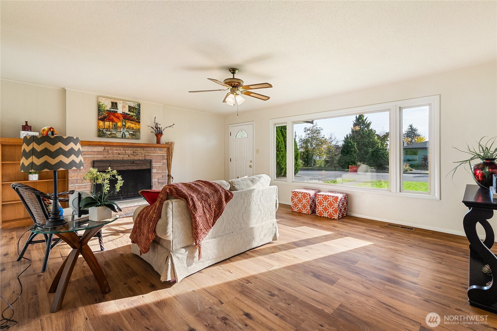 1510 E Street Lynden, WA 98264 - Photo 8 of 32 a living room with furniture fireplace and a large window