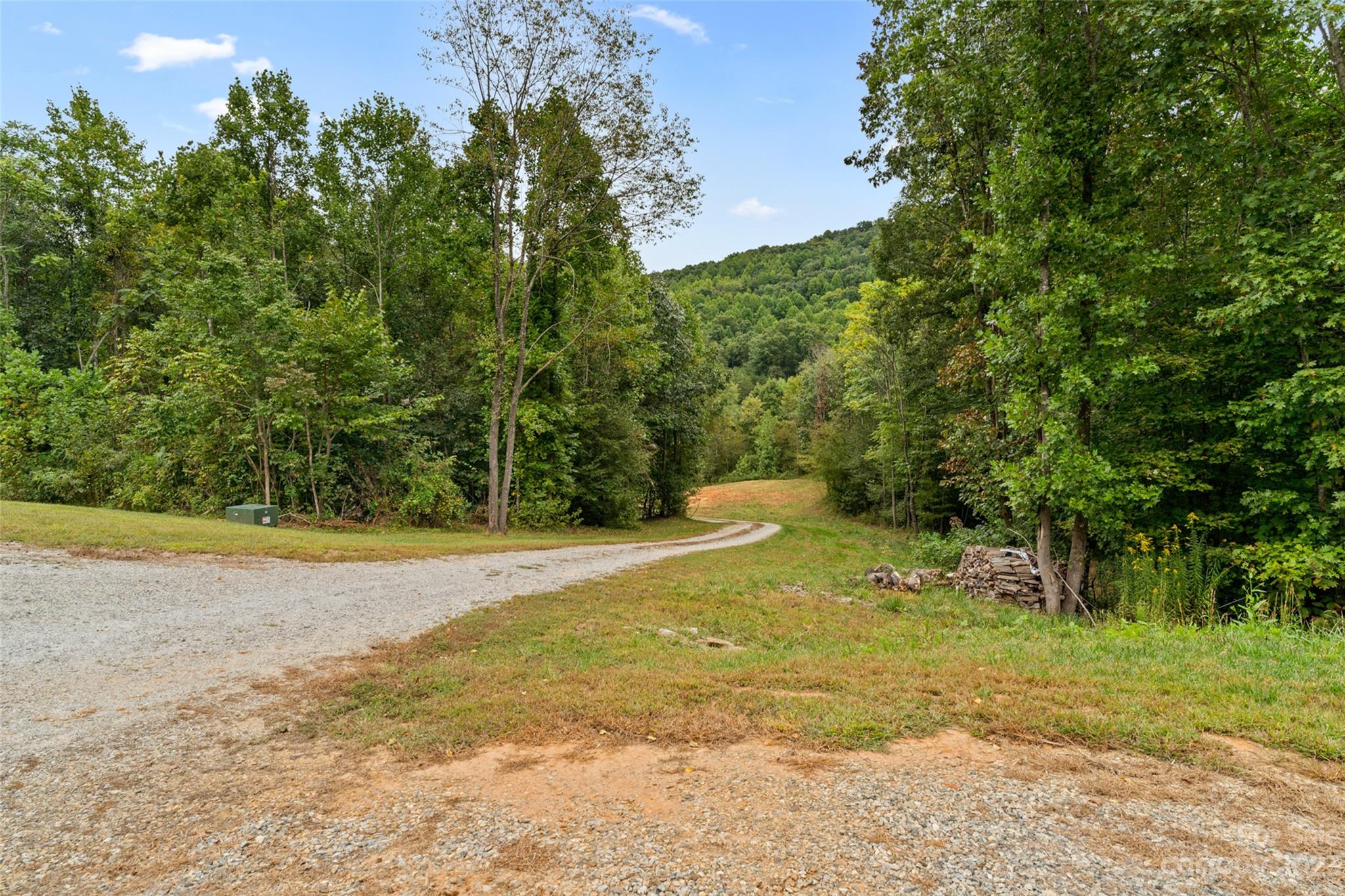 6363 Cheatham Ford Road Hiddenite, NC 28636 - Photo 28 of 32 a view of a yard with swimming pool