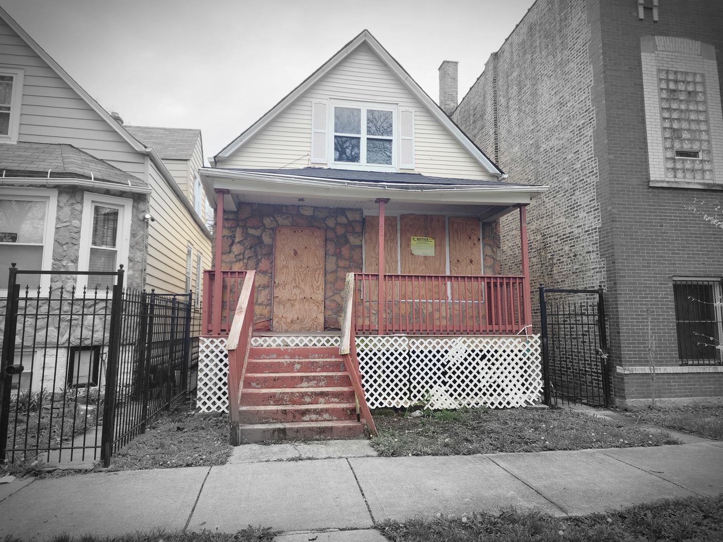 6953 South Elizabeth Street Chicago, IL 60636 - Photo 2 of 20 a front view of a house with a garden
