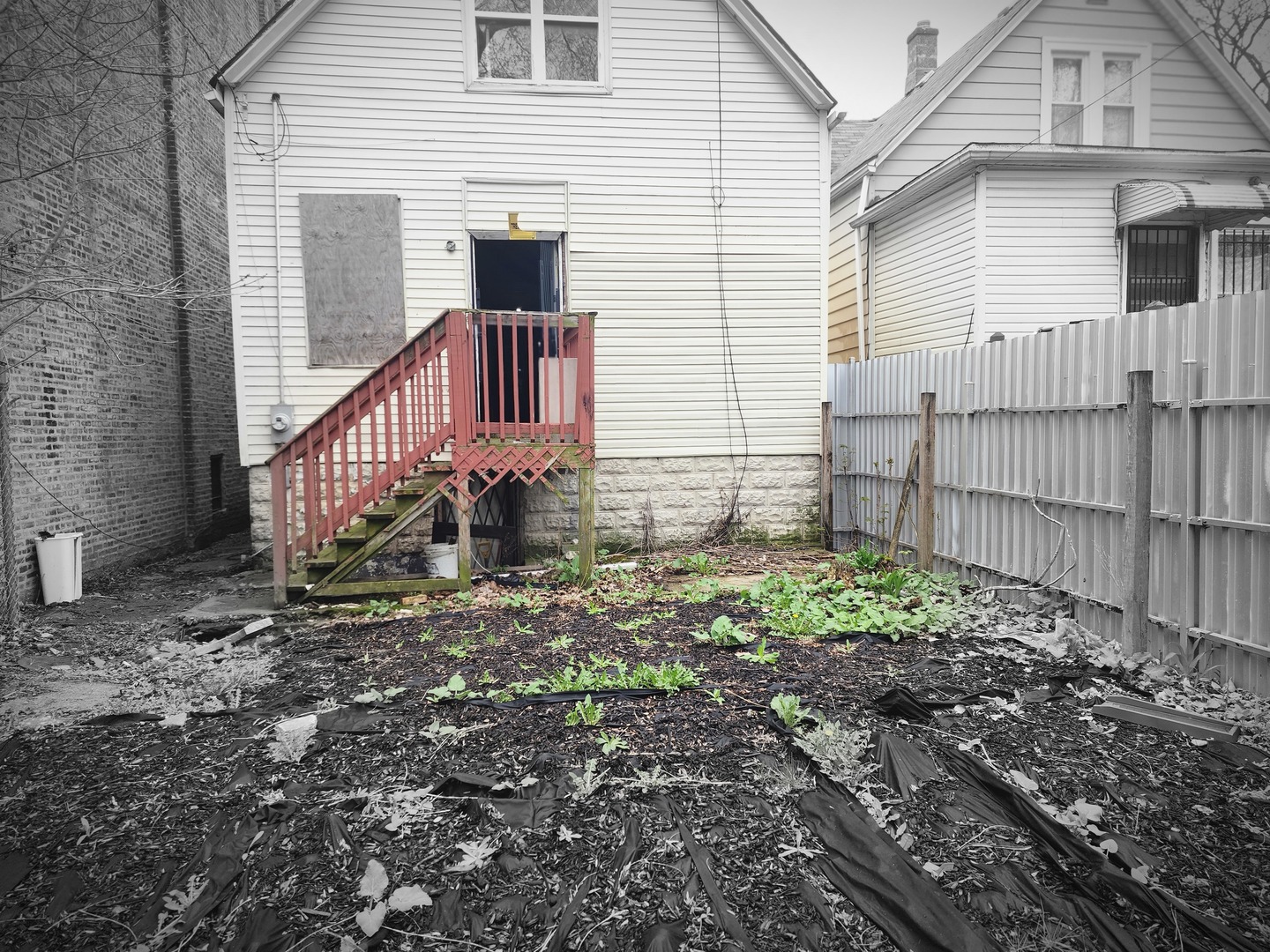 6953 South Elizabeth Street Chicago, IL 60636 - Photo 4 of 20 a view of a house with a yard