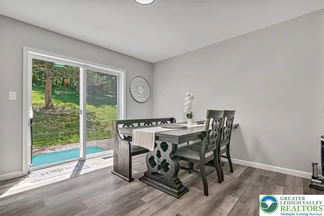 a kitchen with stainless steel appliances granite countertop a refrigerator sink and cabinets