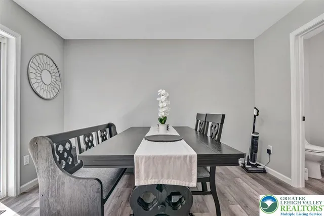 a kitchen with cabinets appliances and a sink