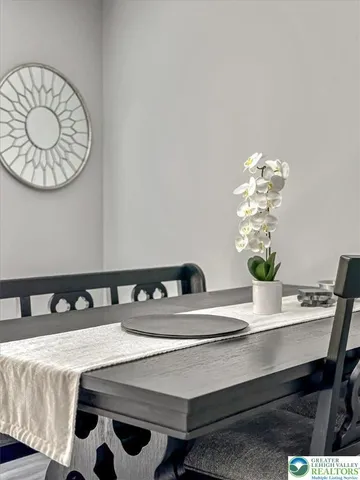 a stove top oven sitting inside of a kitchen