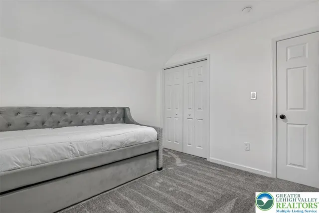 an aerial view of residential house with outdoor space and street view