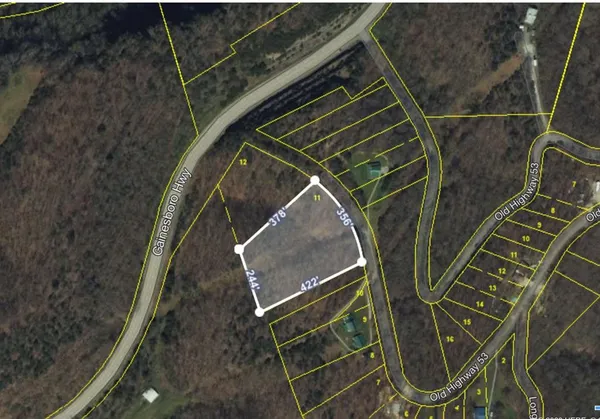 a close up of air conditioner duct and white wooden wall