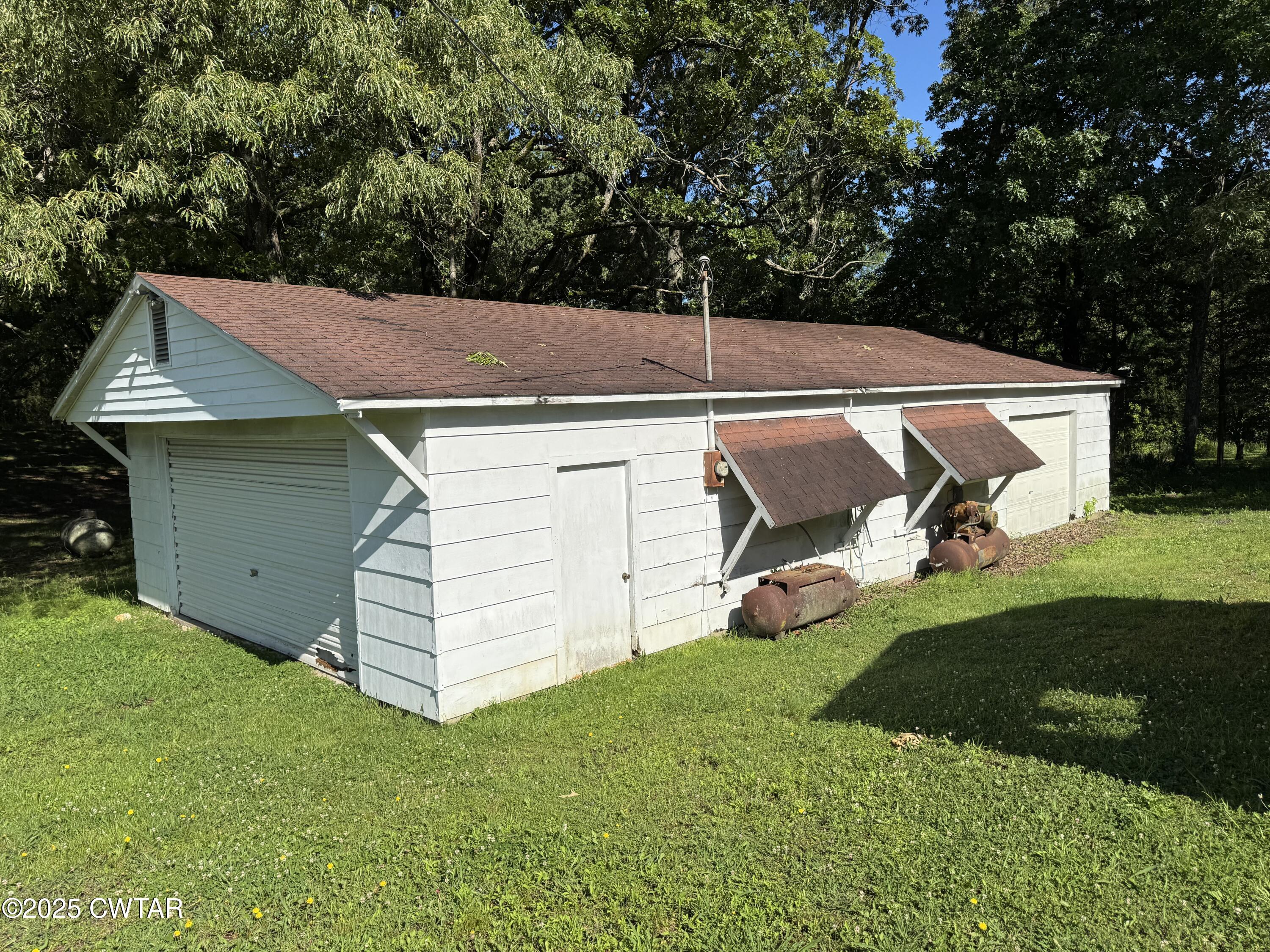 5790 Smyrna Road Westport, TN 38387 - Photo 24 of 26 a aerial view of a house
