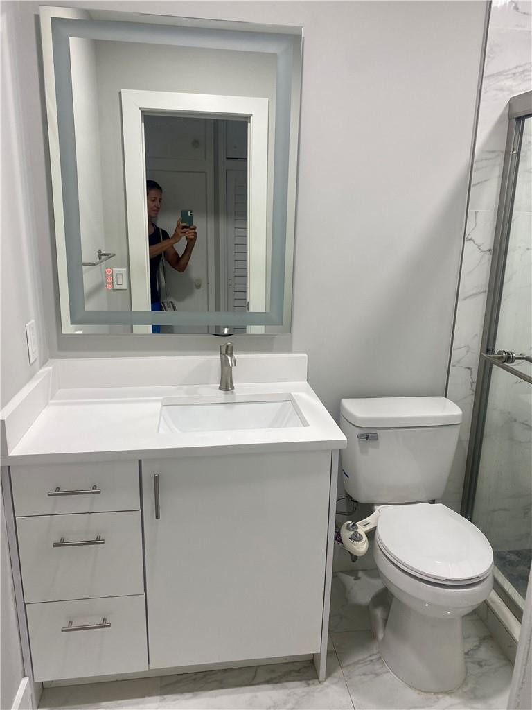 2250 Northeast 36th Street Lighthouse Point, FL 33064 - Photo 8 of 10 Remodeled Bathroom
