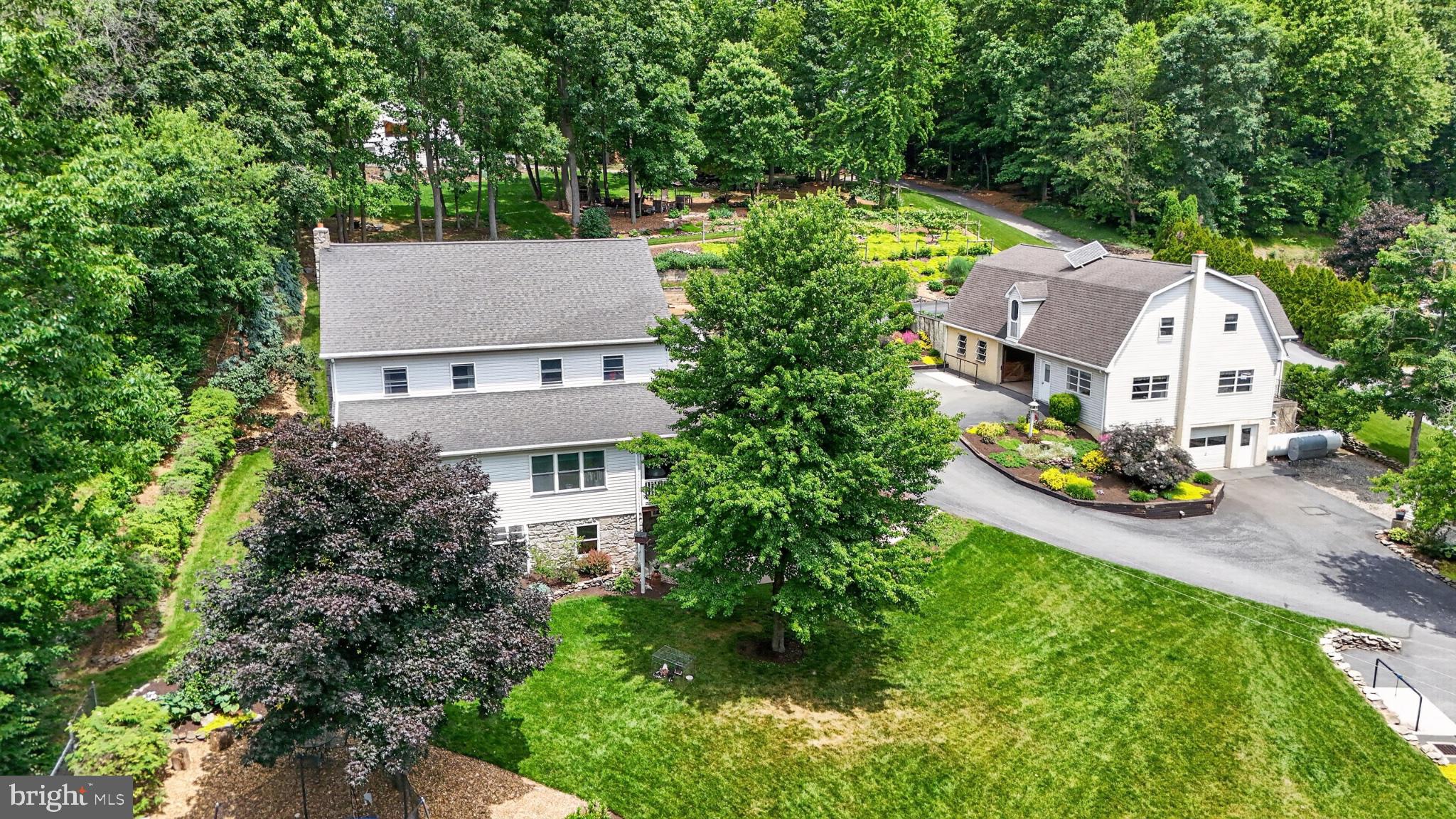 257 Hill Road New Holland, PA 17557 - Photo 8 of 94 Charming home nestled in lush greenery.