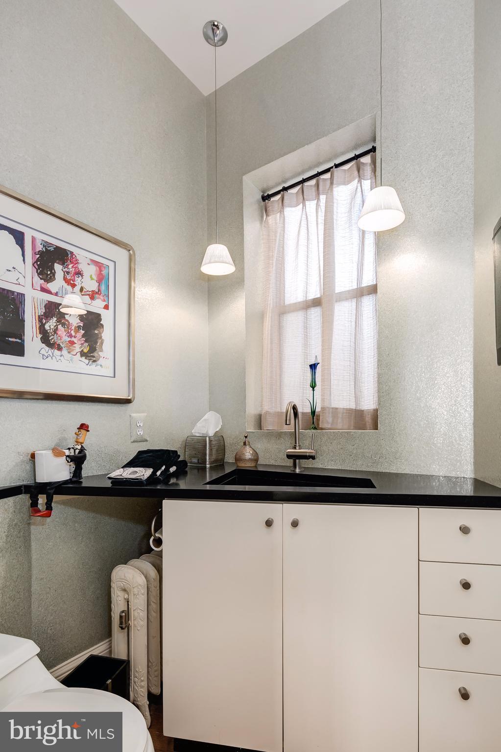 1616 22nd Street Northwest Washington, DC 20008 - Photo 9 of 27 Powder room main level w window