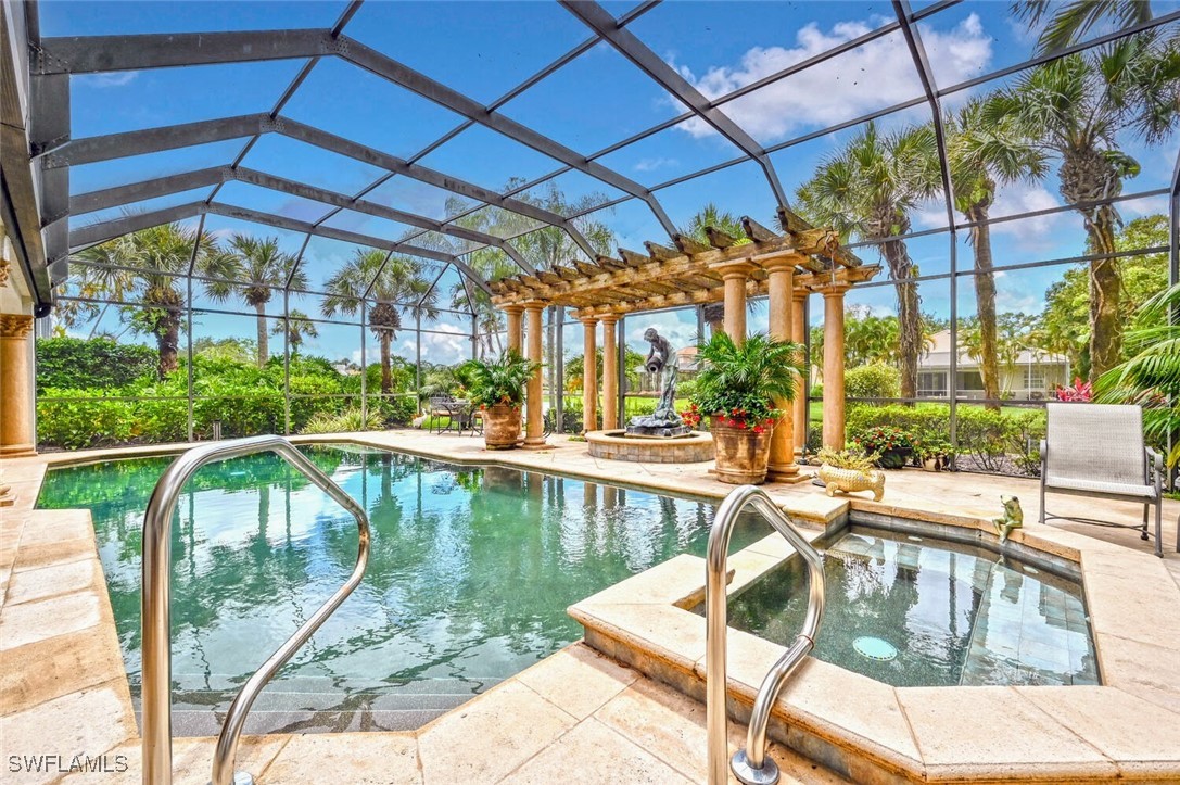 a view of swimming pool with outdoor seating
