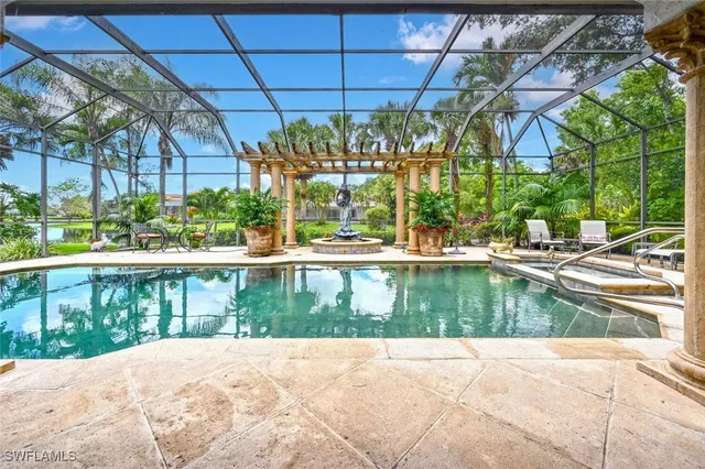 a view of a swimming pool with a patio