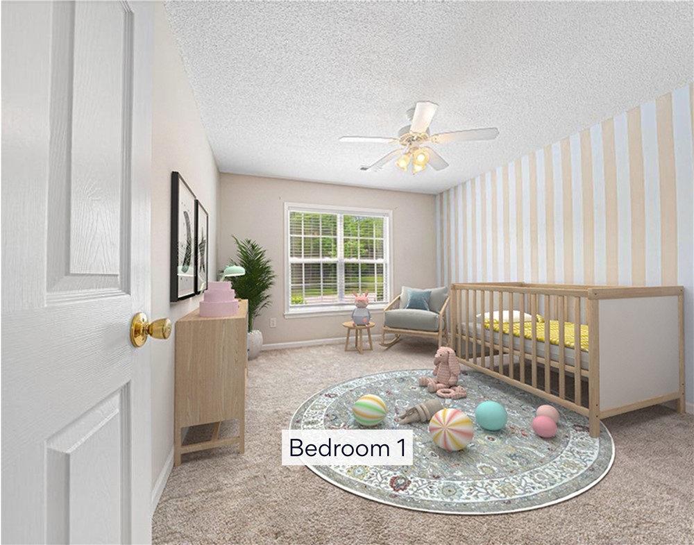848 Perkins Creek Road Seneca, SC 29678 - Photo 18 of 26 A well-lit nursery offers a peaceful environment with patterned wallpaper and plush carpeting.