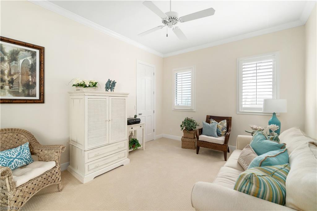 764 Ashburton Drive Naples, FL 34110 - Photo 25 of 30 a living room with furniture and a window