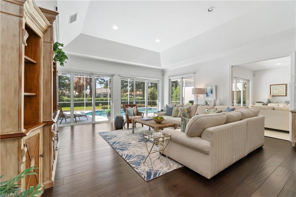 764 Ashburton Drive Naples, FL 34110 - Photo 3 of 30 a living room with furniture and a large window