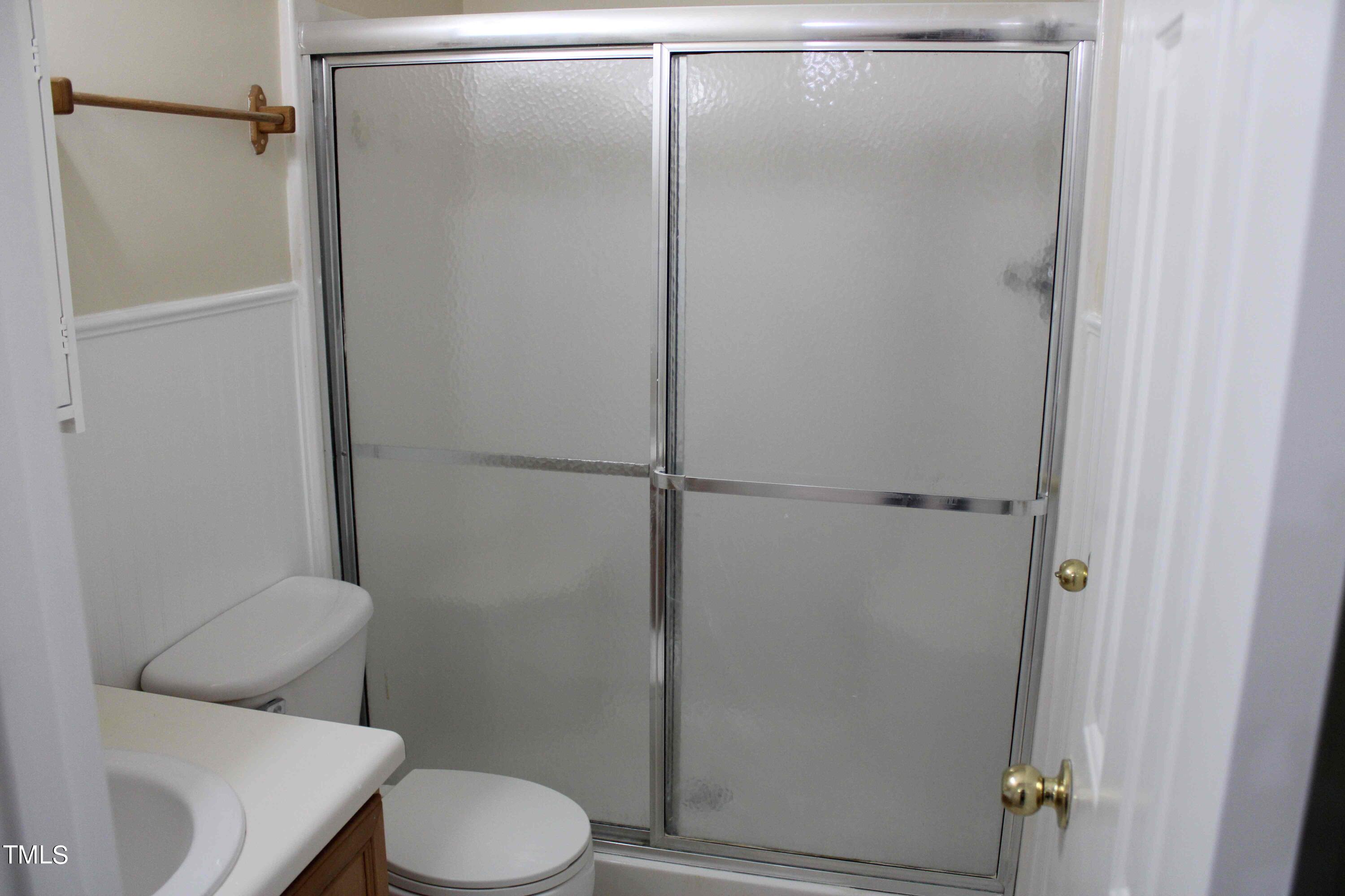 4426 Cottage Stone Drive Raleigh, NC 27616 - Photo 13 of 25 a bathroom with a toilet and a shower