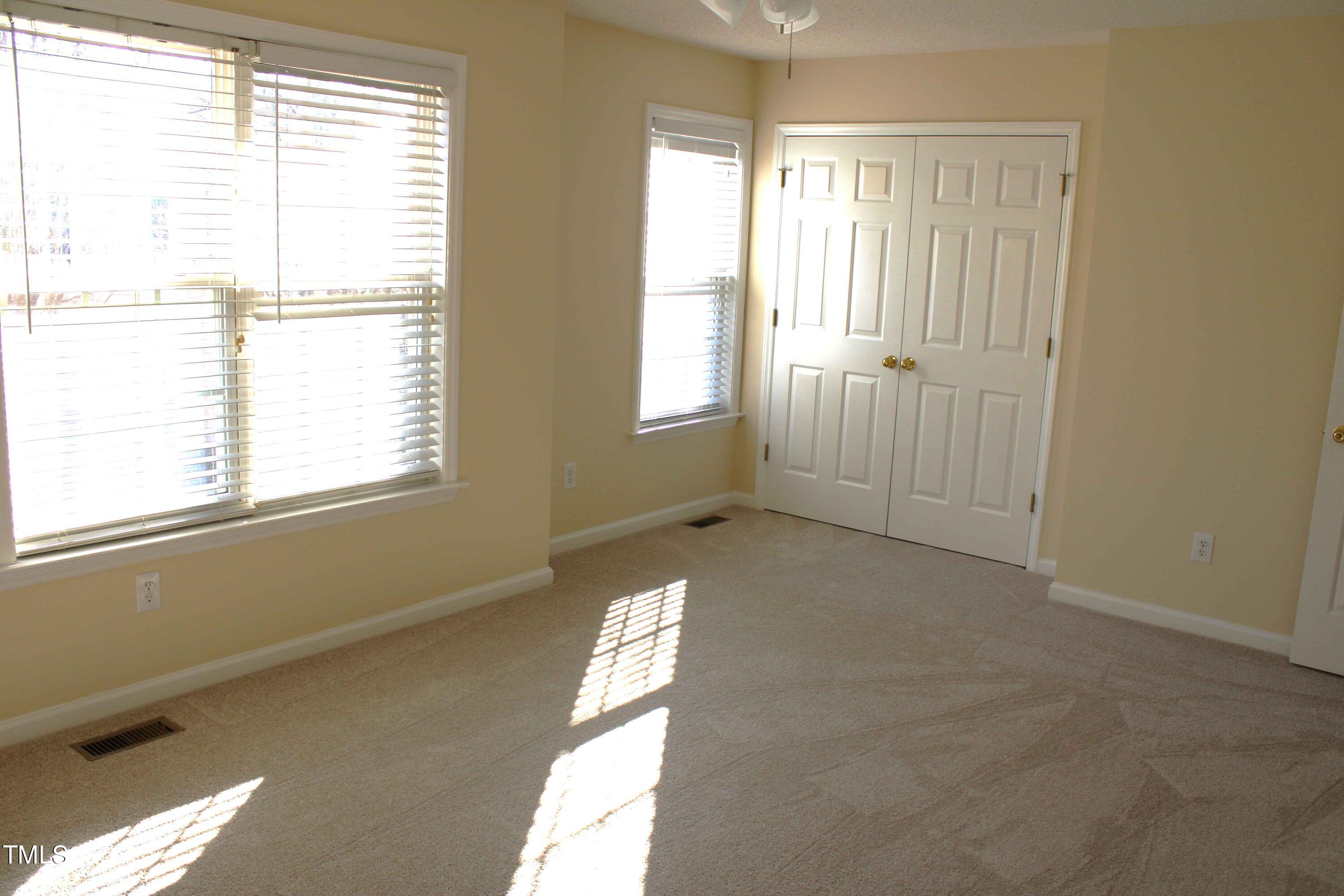 4426 Cottage Stone Drive Raleigh, NC 27616 - Photo 19 of 25 a view of an empty room with a window