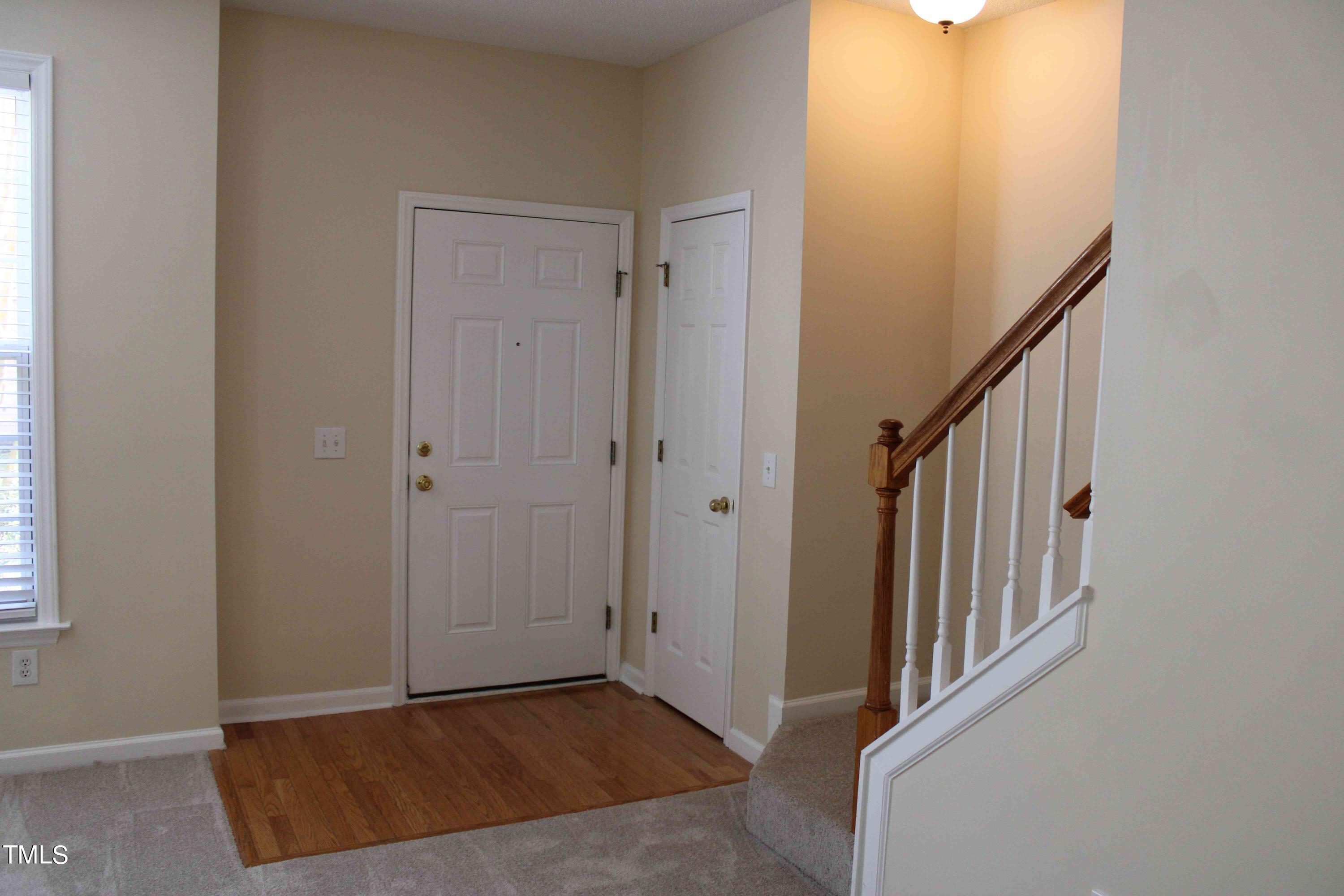 4426 Cottage Stone Drive Raleigh, NC 27616 - Photo 2 of 25 a view of an entryway with staircase