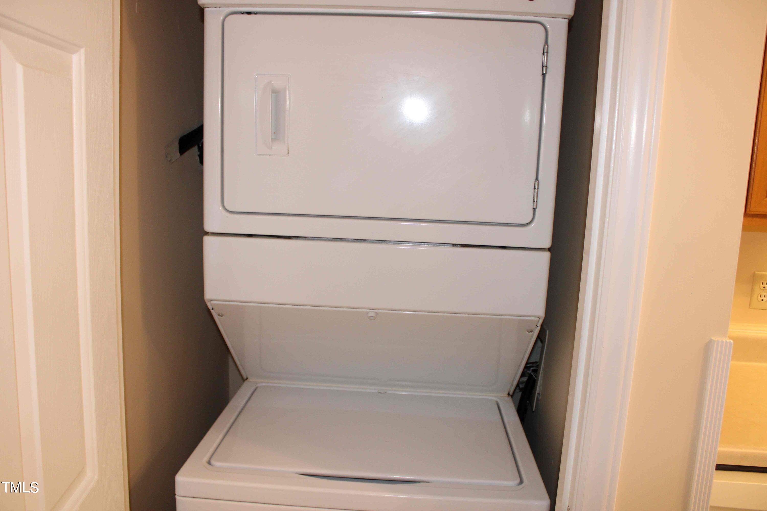 4426 Cottage Stone Drive Raleigh, NC 27616 - Photo 9 of 25 a close up view of washer and dryer