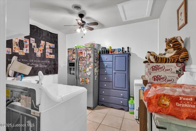 a patio area with table and chairs