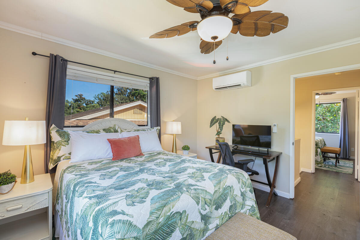 4800 Hanalei Plantation Road, Unit 5A Princeville, HI 96722 - Photo 12 of 20 a bedroom with a bed dresser and a flat tv screen