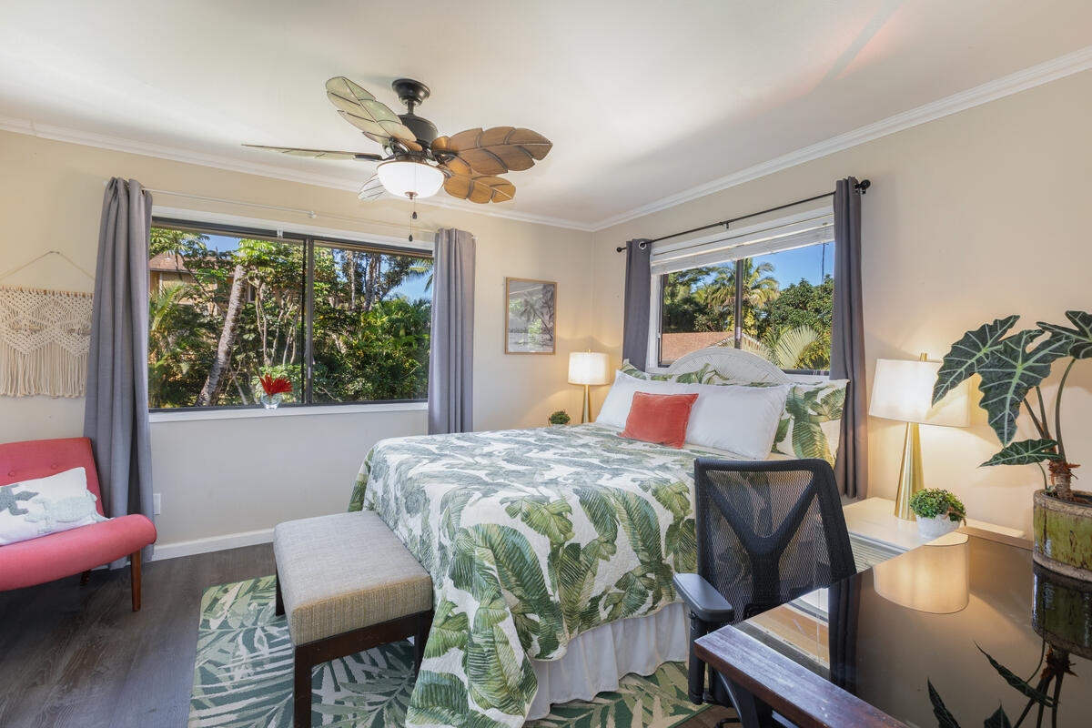 4800 Hanalei Plantation Road, Unit 5A Princeville, HI 96722 - Photo 13 of 20 a bedroom with a bed and a table