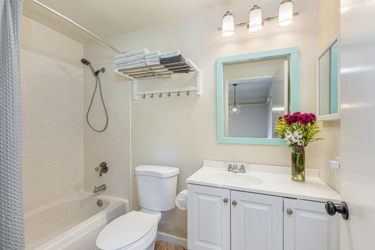 4800 Hanalei Plantation Road, Unit 5A Princeville, HI 96722 - Photo 15 of 20 a bathroom with a sink vanity mirror and toilet