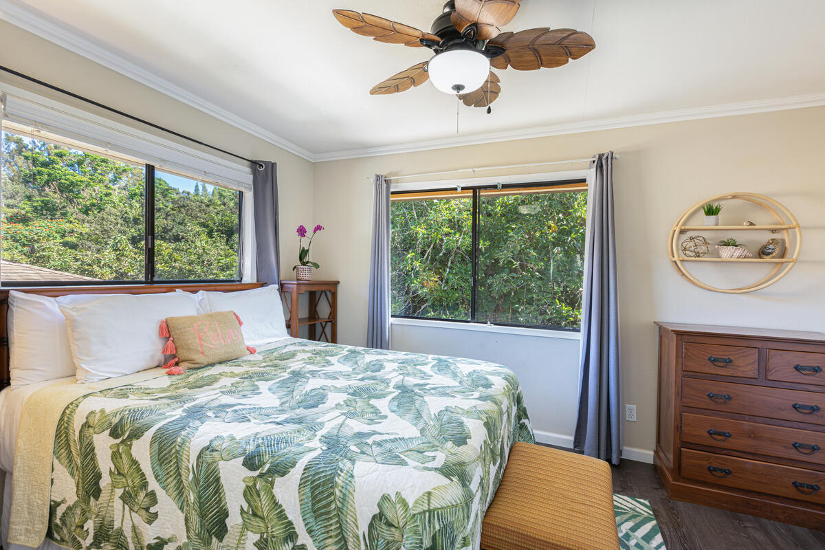 4800 Hanalei Plantation Road, Unit 5A Princeville, HI 96722 - Photo 17 of 20 a bedroom with a large bed and a window