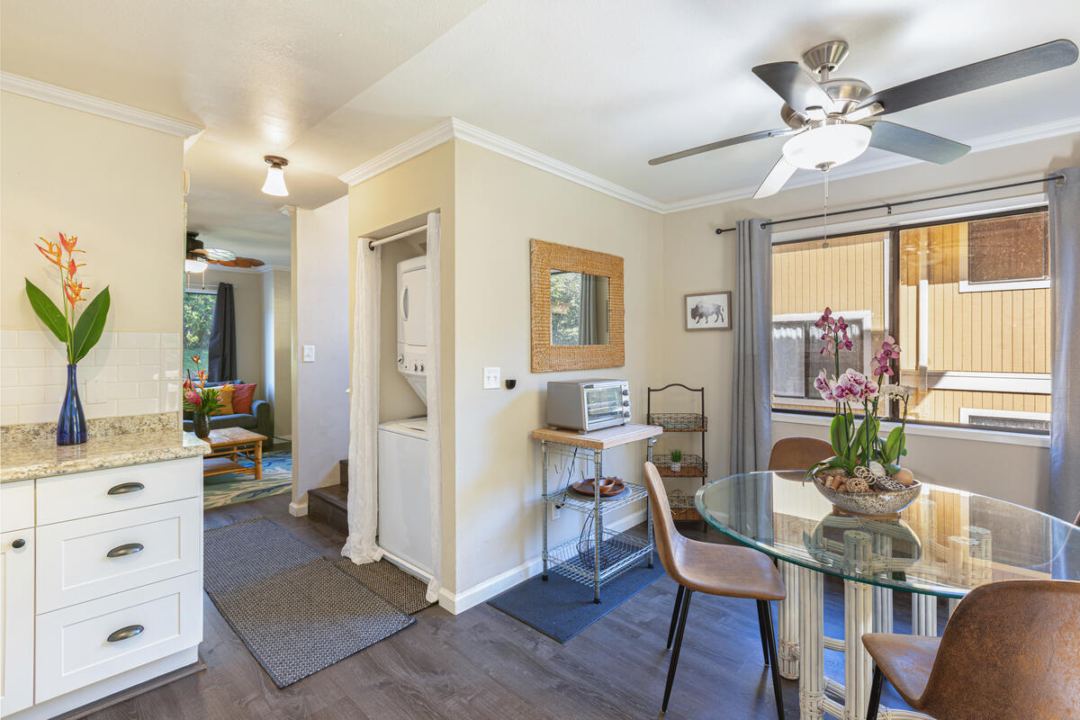 4800 Hanalei Plantation Road, Unit 5A Princeville, HI 96722 - Photo 5 of 20 a view of a dining room with furniture window and outside view