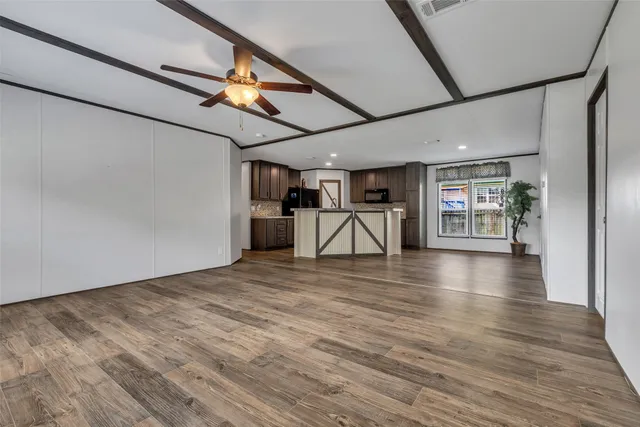 a view of a livingroom with a furniture