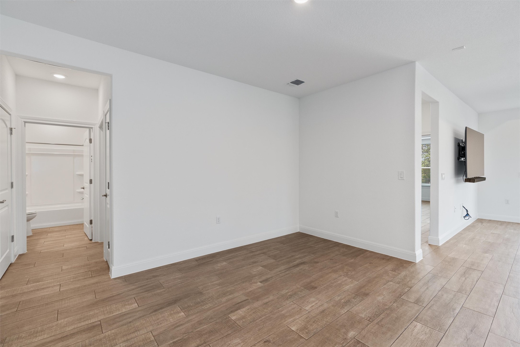 202 Spanish Star Street Georgetown, TX 78633 - Photo 14 of 32 wooden floor in an empty room