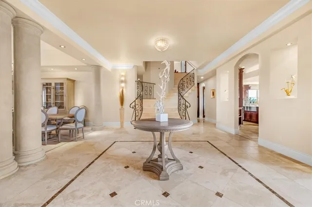 a living room with furniture fireplace and a flat screen tv