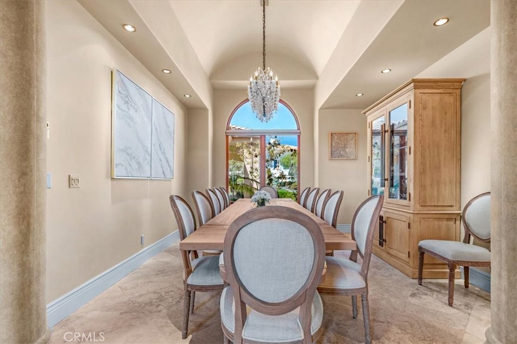 413 Via Bandolero Arroyo Grande, CA 93420 - Photo 13 of 75 a dining room with furniture a chandelier and wooden floor