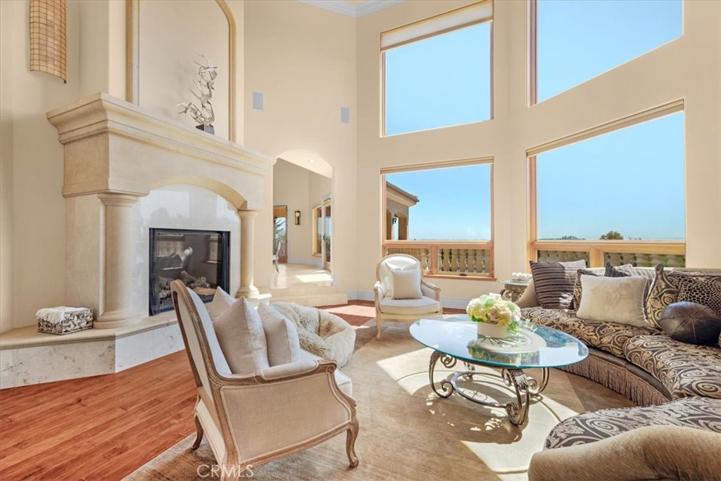 413 Via Bandolero Arroyo Grande, CA 93420 - Photo 14 of 75 a living room with furniture and a fireplace