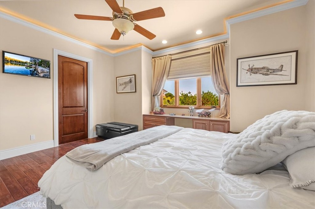 413 Via Bandolero Arroyo Grande, CA 93420 - Photo 17 of 75 a bedroom with a large bed and a window