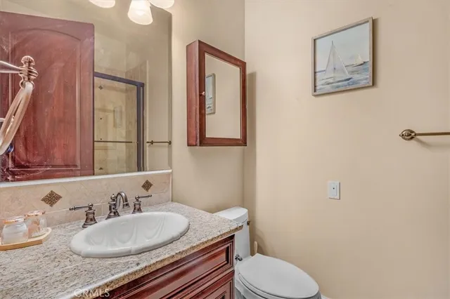 a spacious bedroom with a bed and window