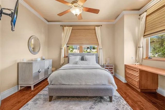 a bathroom with a double vanity sink toilet and shower
