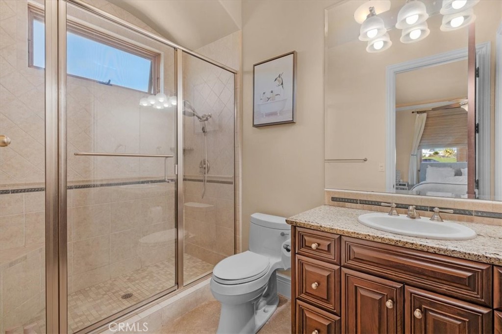 413 Via Bandolero Arroyo Grande, CA 93420 - Photo 22 of 75 a bathroom with a sink toilet and shower