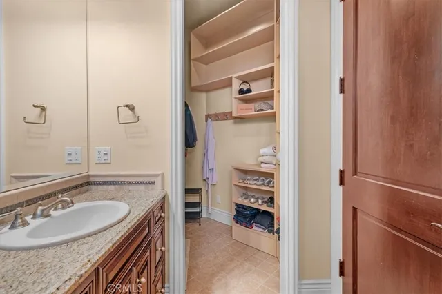 a room with furniture and screen tv