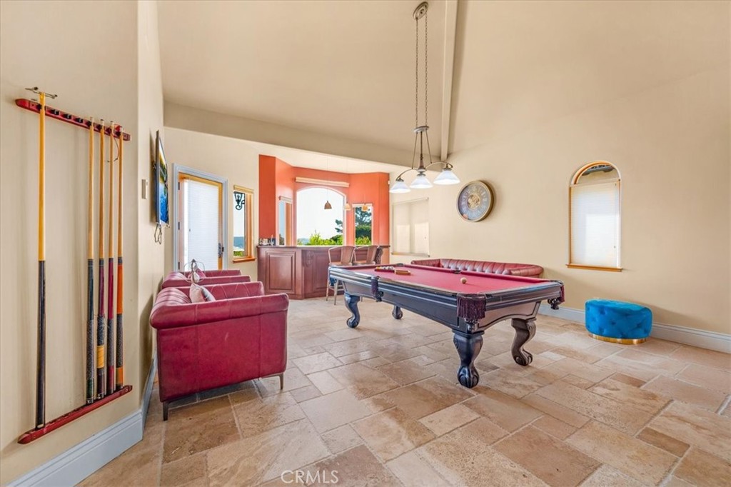 413 Via Bandolero Arroyo Grande, CA 93420 - Photo 28 of 75 a living room with furniture a rug and a window