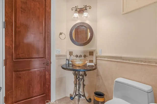a view of a patio with a table and chairs