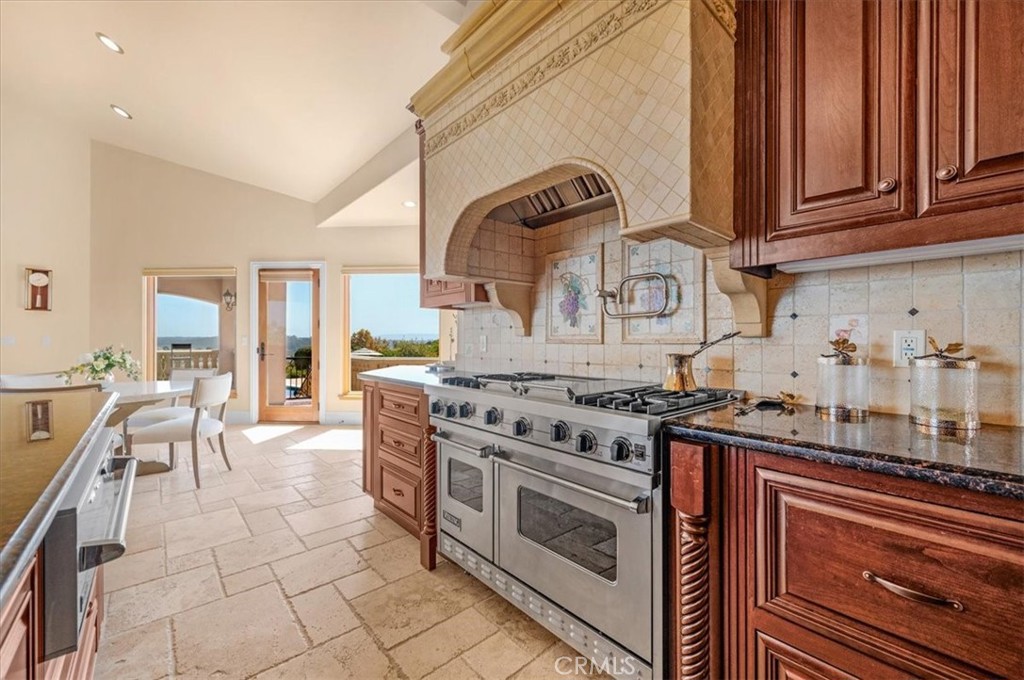 413 Via Bandolero Arroyo Grande, CA 93420 - Photo 34 of 75 a kitchen with stainless steel appliances granite countertop a stove and a sink