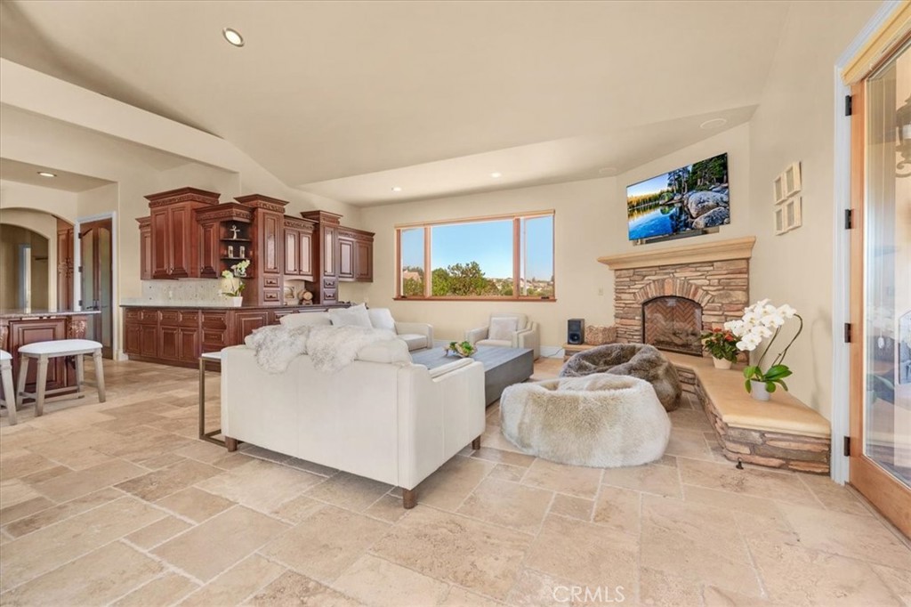 413 Via Bandolero Arroyo Grande, CA 93420 - Photo 36 of 75 a living room with furniture and a fireplace
