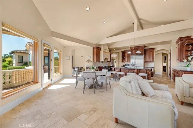 a living room with a sink and a table