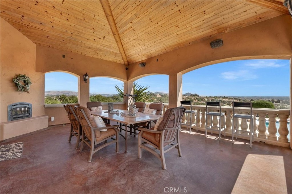 413 Via Bandolero Arroyo Grande, CA 93420 - Photo 38 of 75 a view of a patio with a table and chairs