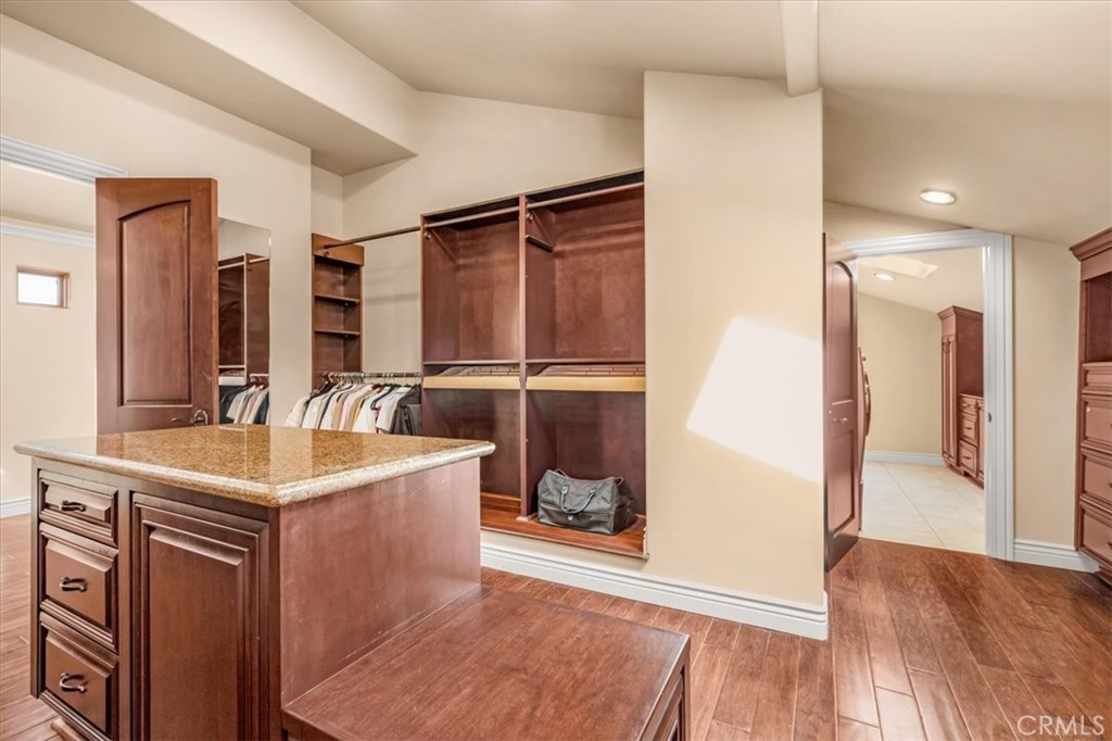 413 Via Bandolero Arroyo Grande, CA 93420 - Photo 45 of 75 a view of a kitchen cabinets and a wooden floor