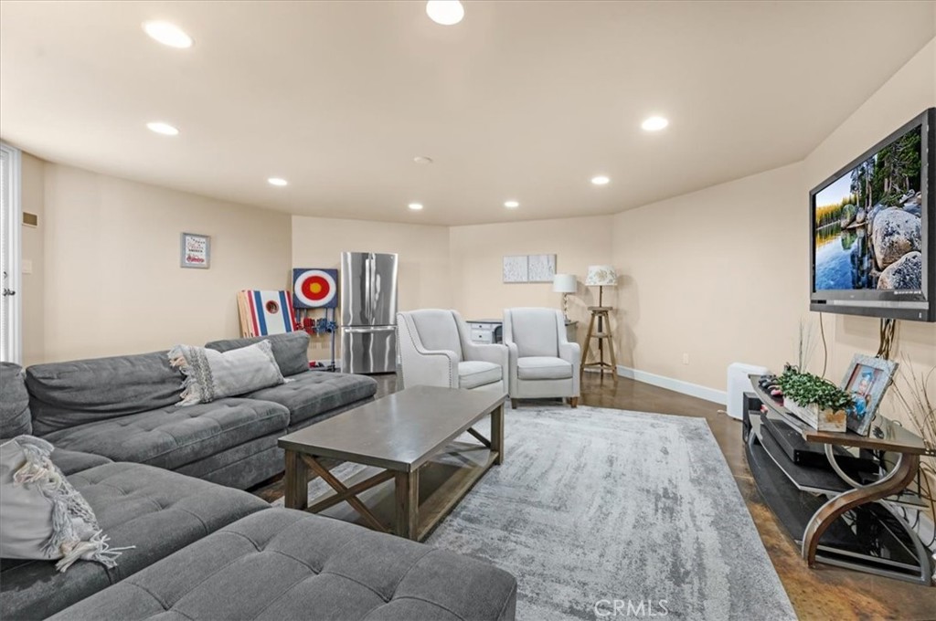 413 Via Bandolero Arroyo Grande, CA 93420 - Photo 58 of 75 a living room with furniture and a flat screen tv