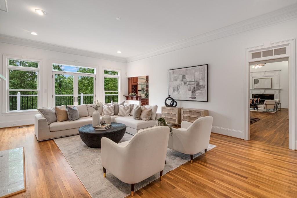 8345 Jett Ferry Road Sandy Springs, GA 30350 - Photo 11 of 61 a living room with furniture and a large window