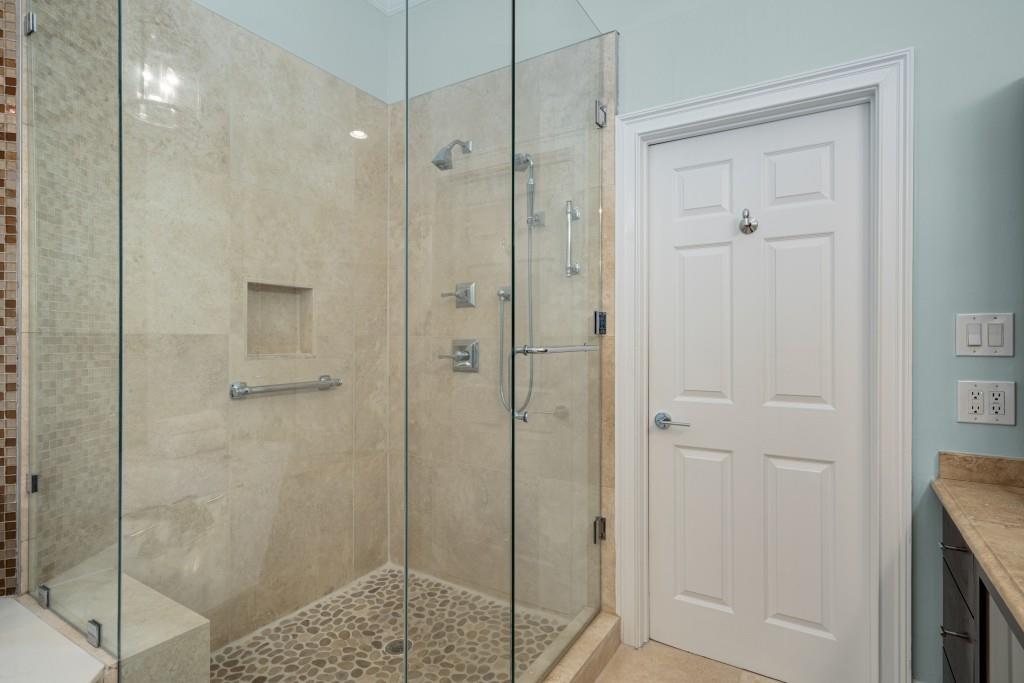 8345 Jett Ferry Road Sandy Springs, GA 30350 - Photo 17 of 61 a bathroom with a shower and a sink